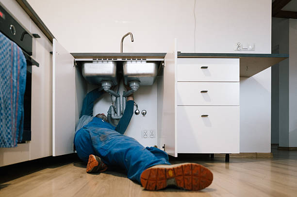 Professional Drain Cleaning technician working in Wyandanch, NY